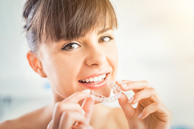 Adult orthodontic patient at Elate Orthodontics in Frisco TX